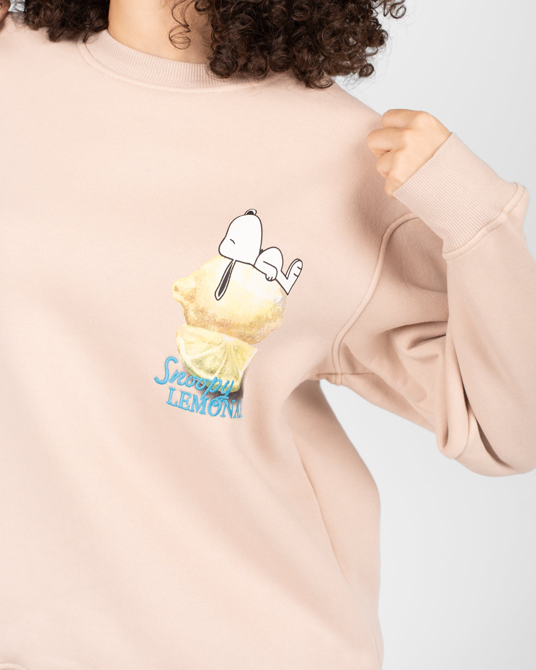 بلوزة سنوبي النسائية بياقة دائرية