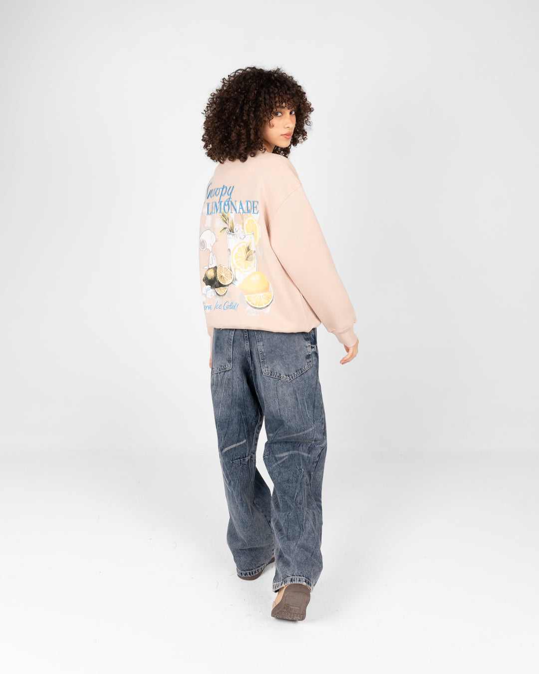 بلوزة سنوبي النسائية بياقة دائرية